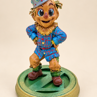 One-of-a-kind hand-painted Scarecrow sculpture with jeweled crown and checked coat on an Oz base